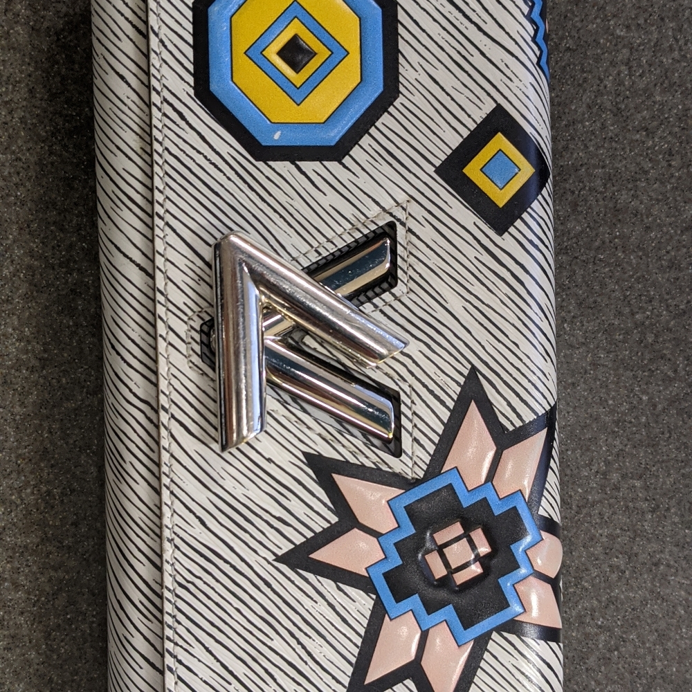 Louis Vuitton Aztec Epi Leather Twist Wallet